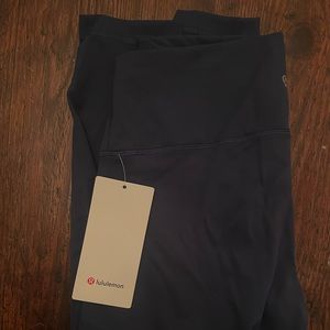 Never worn Navy lulu leggings size 12
